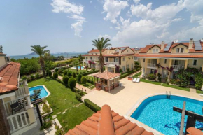 Seaside Residence, Villa Hancer, Denize Sıfır 4 Yatak odalı, 8 kişilik ,Ortak Havuzlu Villa,